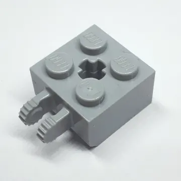 Hinge Brick 2 x 2 Locking with 2 Fingers Vertical and '+' Axle Hole, 9 Teeth