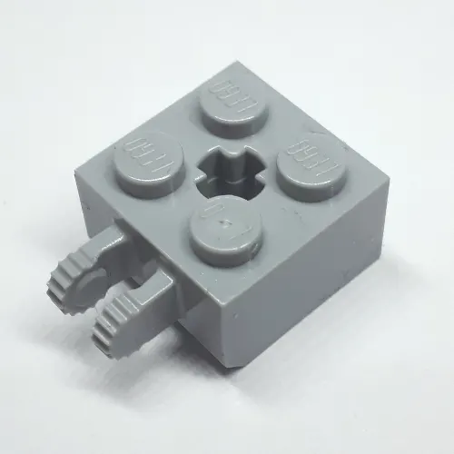 Hinge Brick 2 x 2 Locking with 2 Fingers Vertical and '+' Axle Hole, 9 Teeth