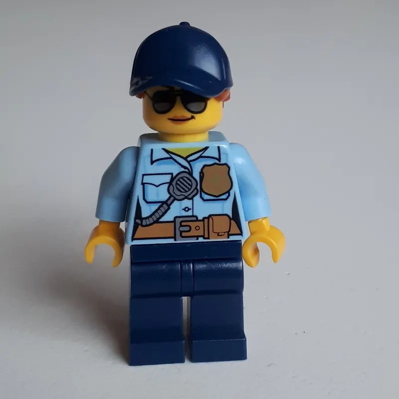 Policewoman Sam Solo, Bright Light Blue Shirt with Radio and Badge, Dark Blue Legs, Dark Blue Cap with Hair, Sunglasses
