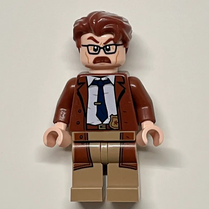 Commissioner James Gordon with Reddish Brown Hair and Long Coat