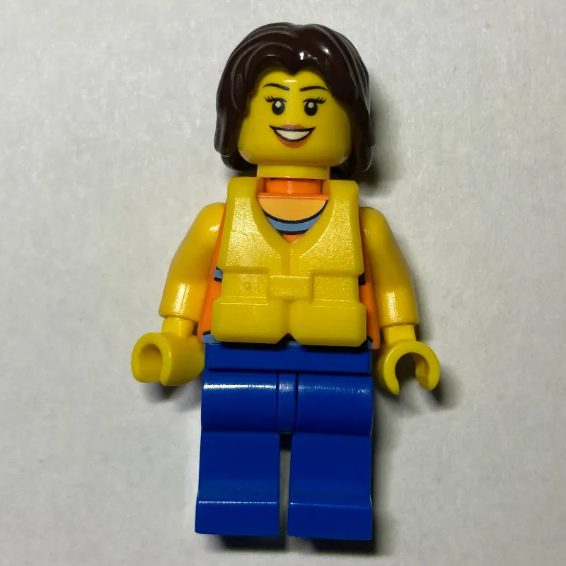 Woman, Orange Halter Top with Flowers, Blue Legs, Yellow Life Vest, Dark Brown Hair