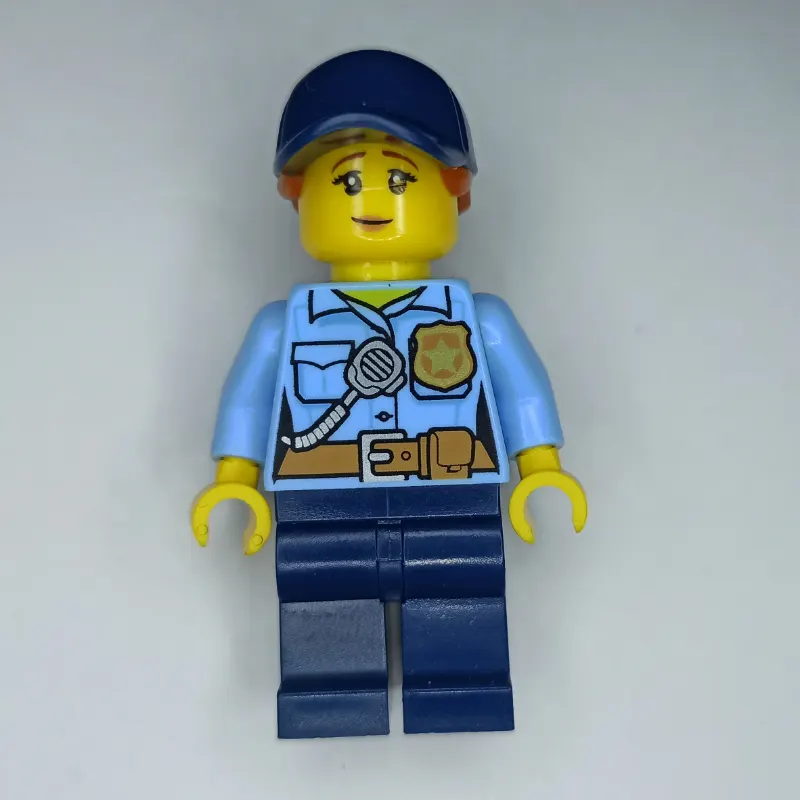 Policewoman, Bright Light Blue Shirt, Dark Blue Legs, Dark Blue Cap with Ponytail