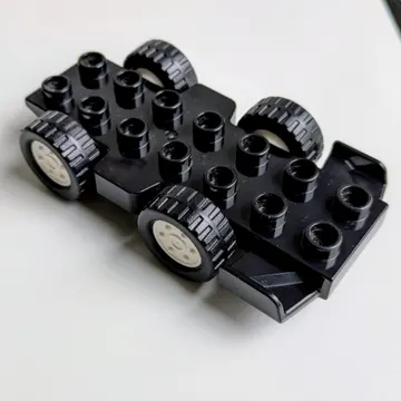 Duplo Car Base 2 x 8 with Front Spoilers, White Hubs