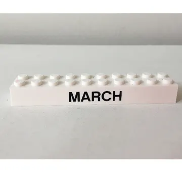 Brick 2 x 10 with Black 'MARCH' / 'APRIL' Print