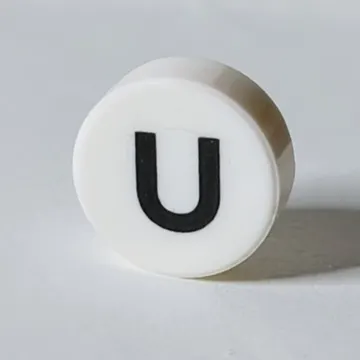 Tile Round 1 x 1 with Black 'U' print