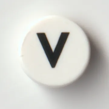 Tile Round 1 x 1 with Black 'V' print