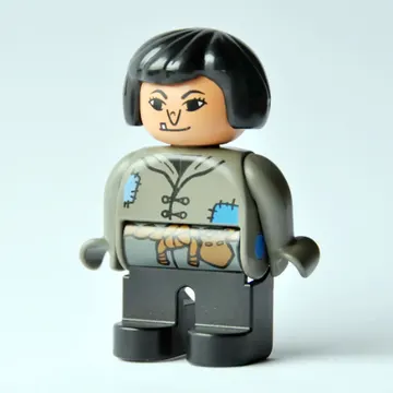 Duplo Figure, Early, Hair Bob Black, Black Legs, Tunic with Blue Patches and Rope Belt, Wart on Nose (Actress)