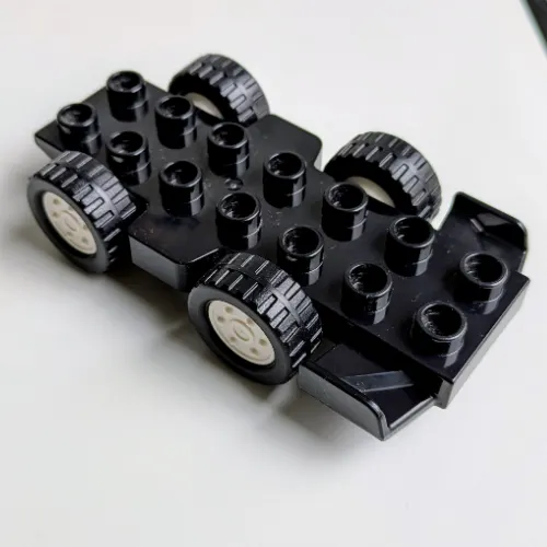 Duplo Car Base 2 x 8 with Front Spoilers, White Hubs